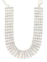 5 Row Crystal Dog Necklace - This amazing necklace contains between 175 to 210 Swarovski Crystals in 5 rows and is finished with a Paw pendant clasp also in Crystal. (X-Small: 175 Crystals / Small: 190 Crystals / Medium: 210 Crystals). This creation is all about being bold, glamorous and being seen.