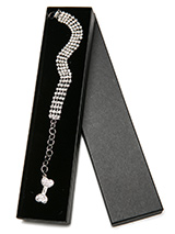 Four Row Crystal Dog Necklace - This four row Crystal Dog Necklace is simple yet elegant, perfect for special occasions. But if you feel like dressing up then that's as good an excuse as any for looking good. Finished with a beautiful crystal encrusted bone charm.