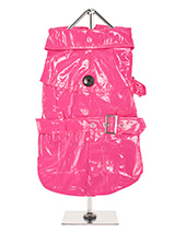 Fuschia Waterproof Trench Coat  - This iconic high gloss trench coat is a key piece for any winter wardrobe and represents an exciting twist on this classic wardrobe staple. It is 100% waterproof with a leash hole to allow a harness to be worn underneath the coat. This sophisticated yet practical trench coat has a fully adjustable b...