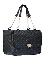 Coco Pet Carrier - A pet carrier and fashion statement all rolled into one! Our Coco Pet  Carrier is especially designed to help you look fabulous and make your  pet's journey as comfortable and as safe as possible. It has a  beautiful quilted outer with a mesh window at one end and another  across the top of the bag....
